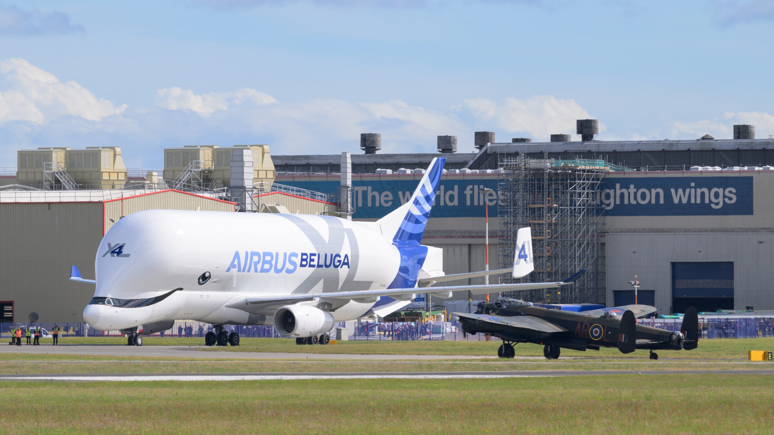 Broughton,,United,Kingdom,30th,May,2025:,Lancaster,Bomber,With,The airbus Beluga